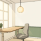 Lichte Nederlandse thuiswerkhoek met een zit-sta bureau, ergonomische stoel, potplant en hanglamp in Scandinavische stijl.